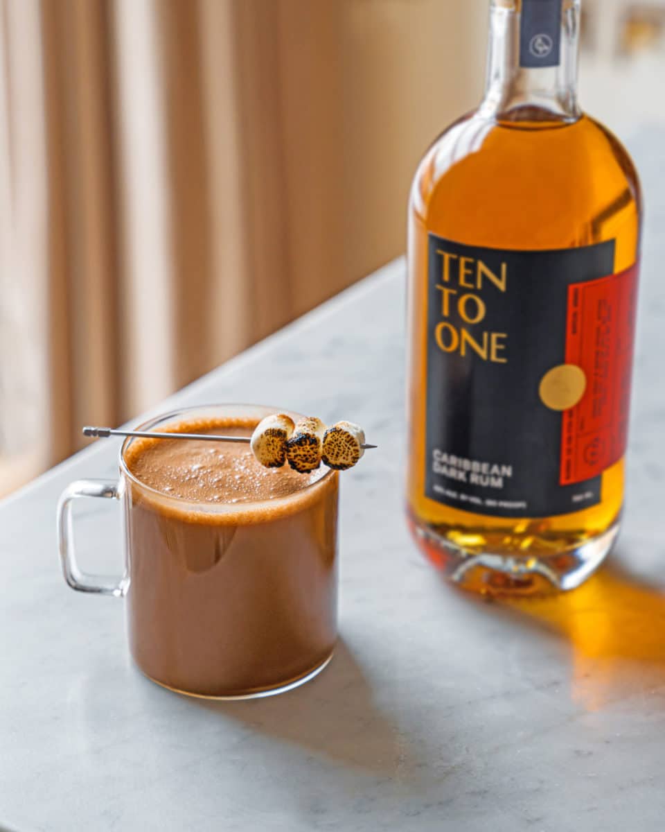 Ten To One Dark Rum Hot Cocoa cocktail with toasted marshmallow garnish