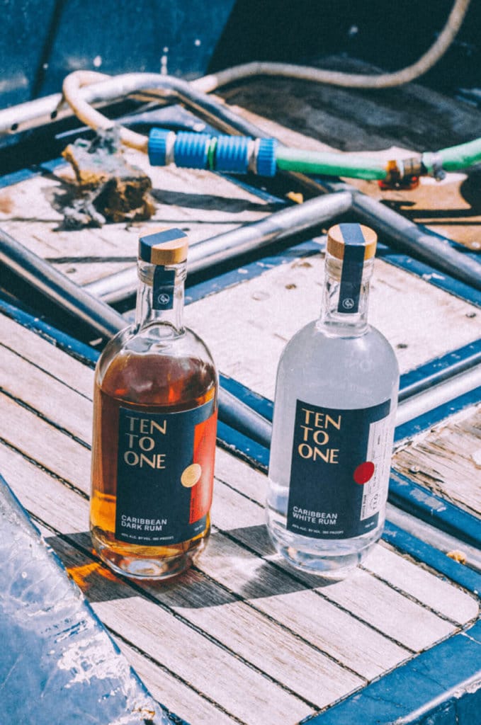 Two bottles of Ten To One Rum on a boat