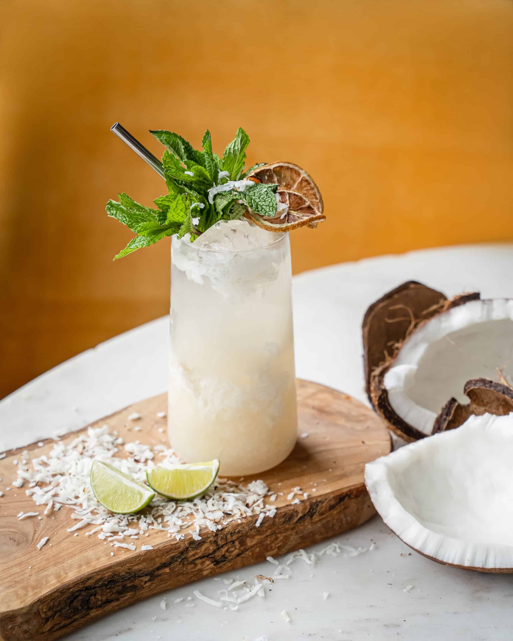 Coconut mojito with Ten To One rum with a mint garnish